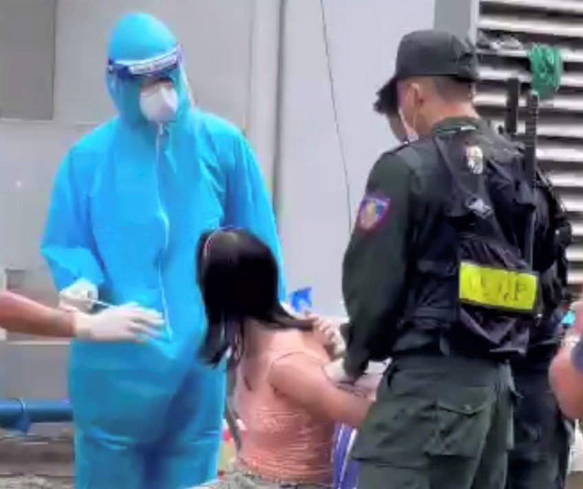 TP Thuan An yeu cau giai trinh vu cuong che nguoi phu nu di xet nghiem hinh anh