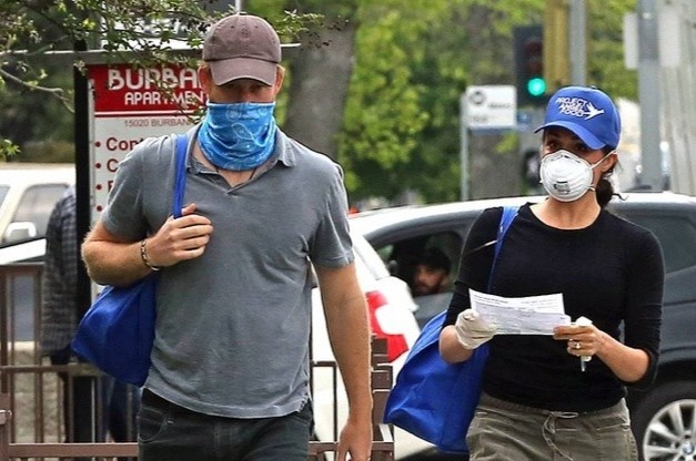 Vo chong Meghan - Harry so bi theo doi, khung bo hinh anh