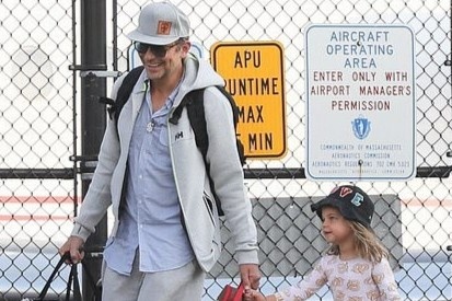 Bradley Cooper va con gai du sinh nhat ong Obama hinh anh