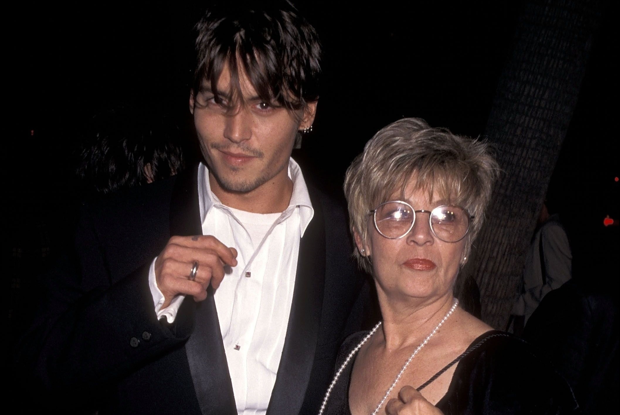 Johnny Depp tung bi me bo roi hinh anh