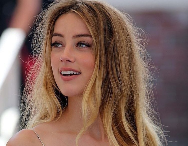 Moi chuyen deu tai Amber Heard? hinh anh