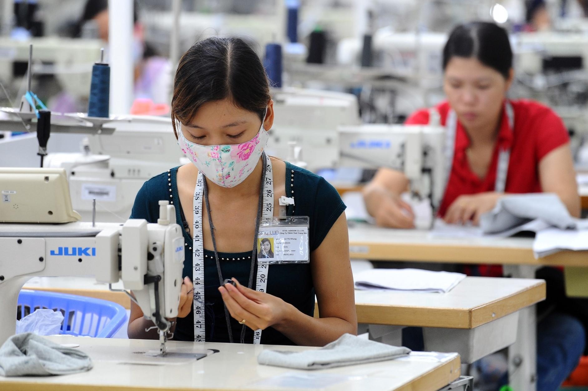 Thu tuong giao Bo Cong Thuong xu ly vuong mac nganh det may anh 1