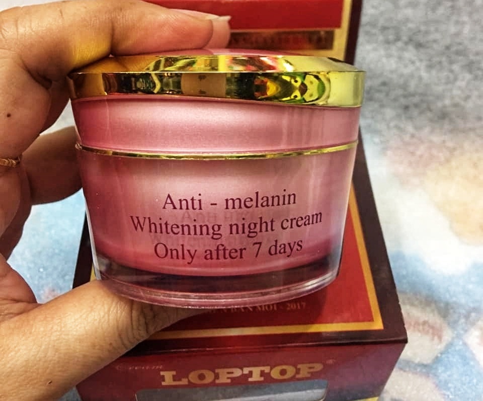 Thu hoi kem duong trang da Loptop vi chua chat cam hinh anh