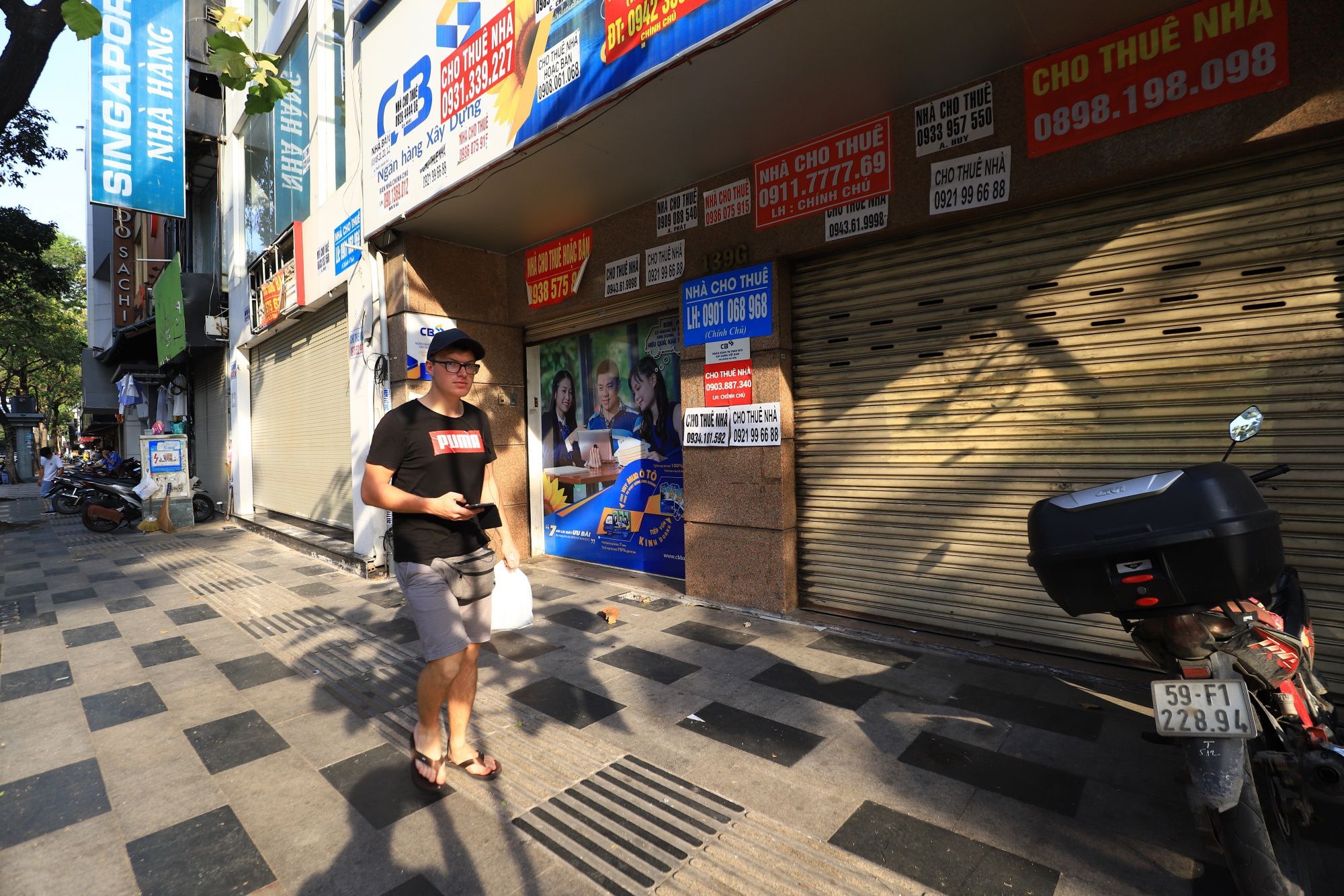 Moi gioi bat dong san cung lao dao vi dich Covid-19 anh 1