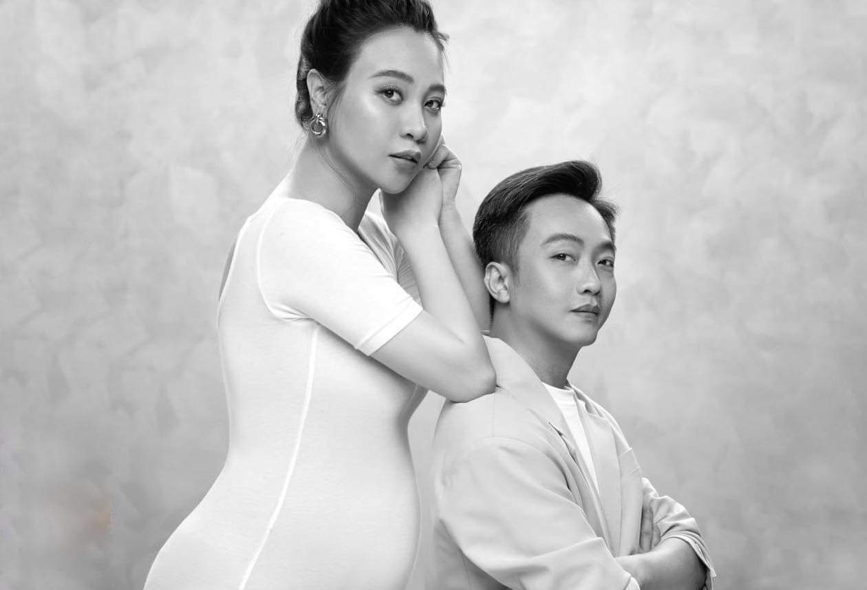 Dam Thu Trang lan dau khoe bung bau hinh anh