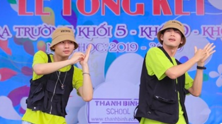 Quang Dang bi phan ung khi nhay 'Bigcityboi' o truong hoc hinh anh