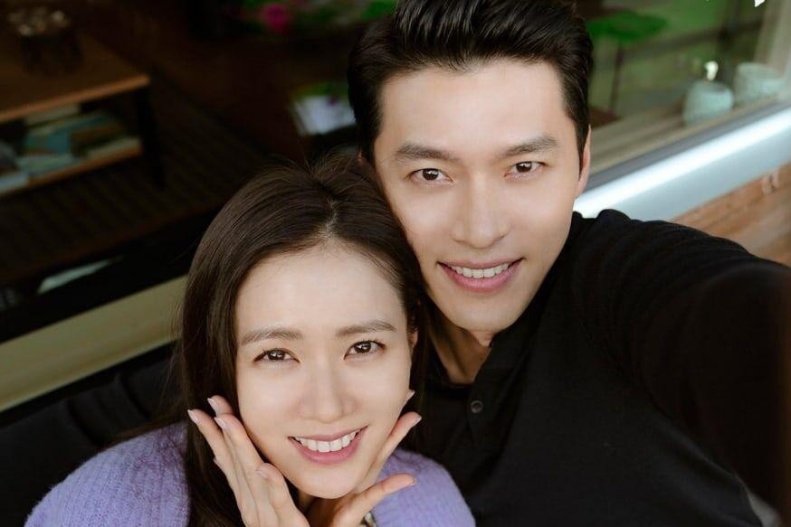Hyun Bin va Son Ye Jin cung di mua do the thao hinh anh