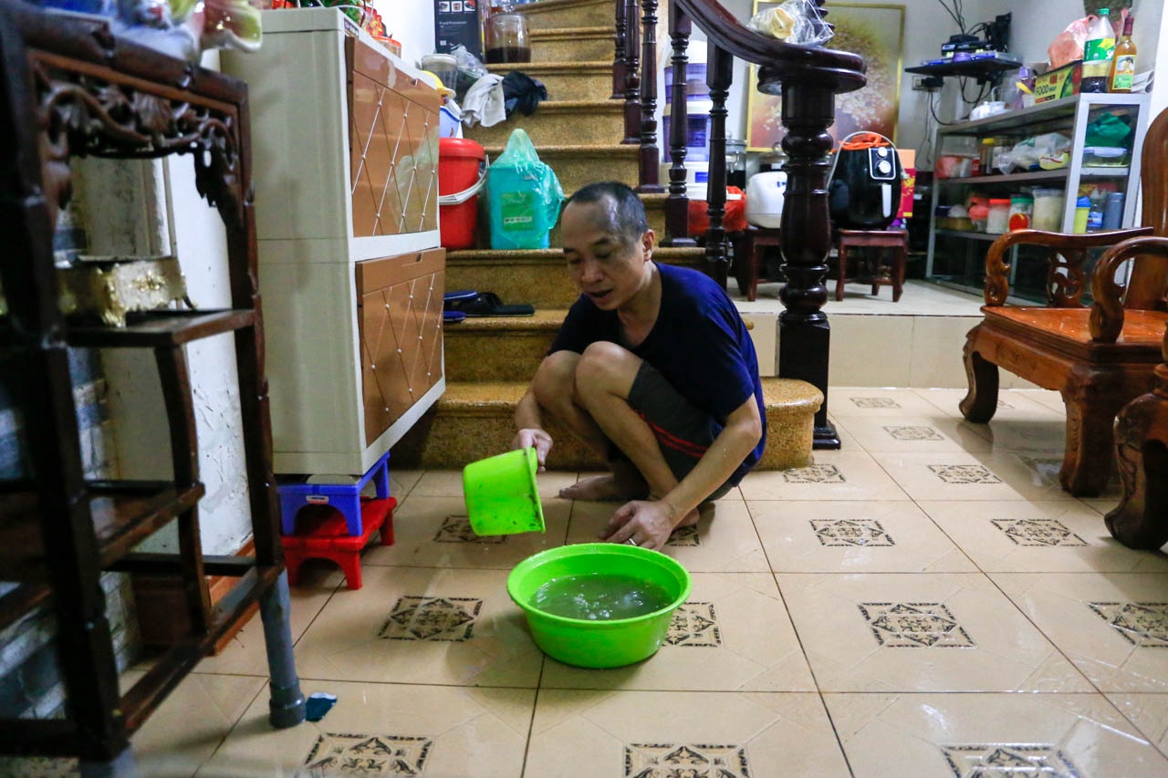 Nguoi Ha Noi don dep nha cua sau mua lon anh 12