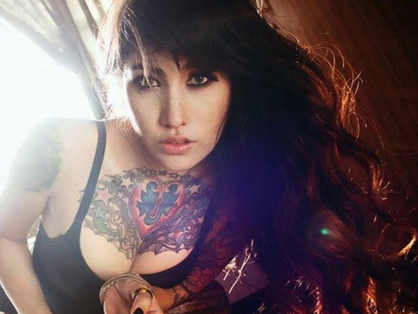 Co gai Thai so huu hinh xam khung hinh anh