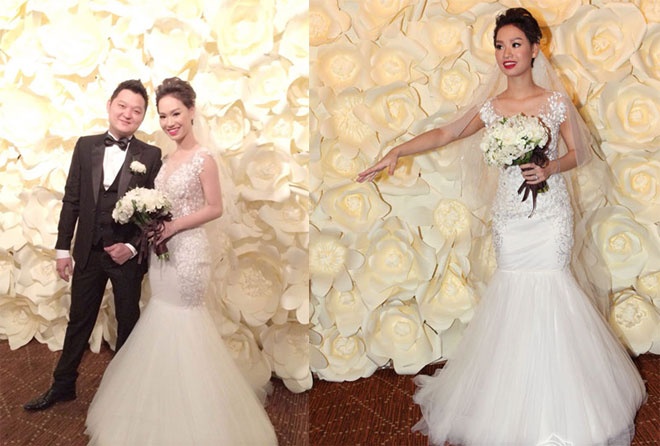  Vốn nổi tiếng sexy, gợi cảm, nên mẫu áo cưới được Trà My chọn lựa cho ngày trọng đại cũng được thiết kế theo phong cách đặc trưng, với những khoảng hở táo bạo ở phần thân trên giúp người đẹp khoe khéo vòng 1 căng đầy. Chất liệu voan trong suốt kết hợp ren, đính hơn 3000 viên pha lê cao cấp tạo nên nét đẹp ngọt ngào, quyến rũ cho cô dâu xinh đẹp của Vbiz.