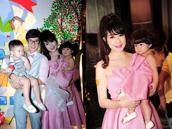 Và cả chiếc áo dài duyên dáng, bộ đầm đôi “ton sur ton” đính nơ độc đáo khiến fan phải “rung rinh”.