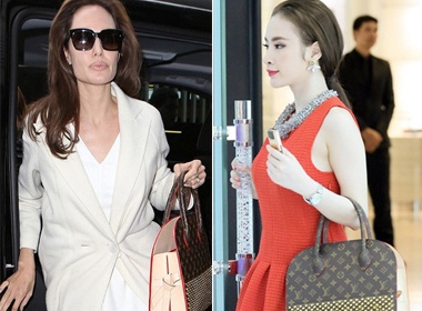 Angela Phuong Trinh dung tui hang hieu voi Angelina Jolie hinh anh