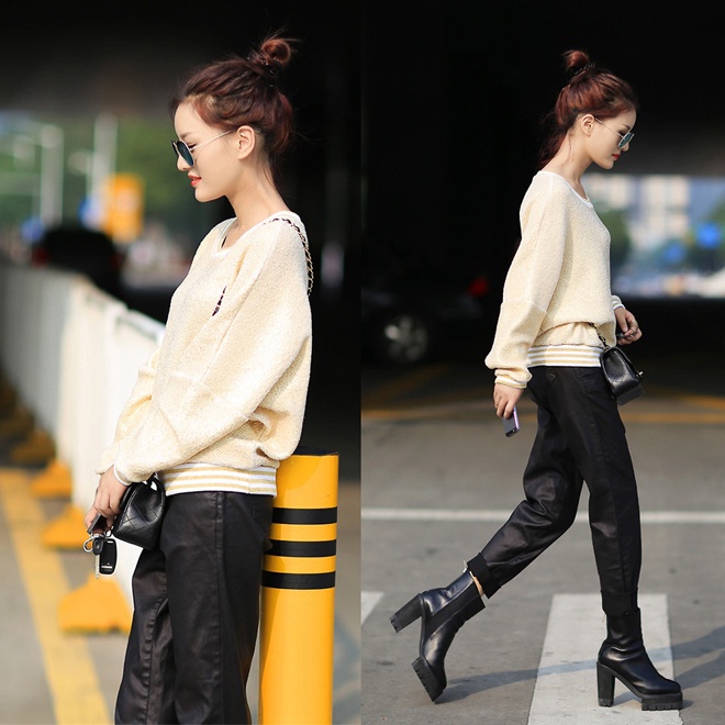 1. Bốt đen, áo phom rộng và quần baggy. Những chiếc quần xắn gấu ống rộng, trẻ trung và năng động với chất liệu jeans, kaki hay da vốn rất hợp cạ với bốt đen, nhất là khi bạn mix, match chúng cùng áo len mùa đông phom rộng như fashionista SE7EN.