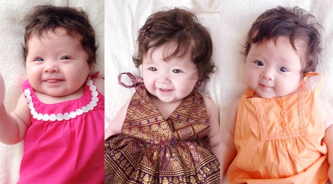 Bé con sở hữu mái tóc xoăn và đôi mắt to tròn, khuôn miệng nhỏ hồng này cũng rất thích diện đẹp với đủ loại đầm xòe dù được thiết kế đơn giản nhưng vẫn rất dễ thương và xinh xắn.