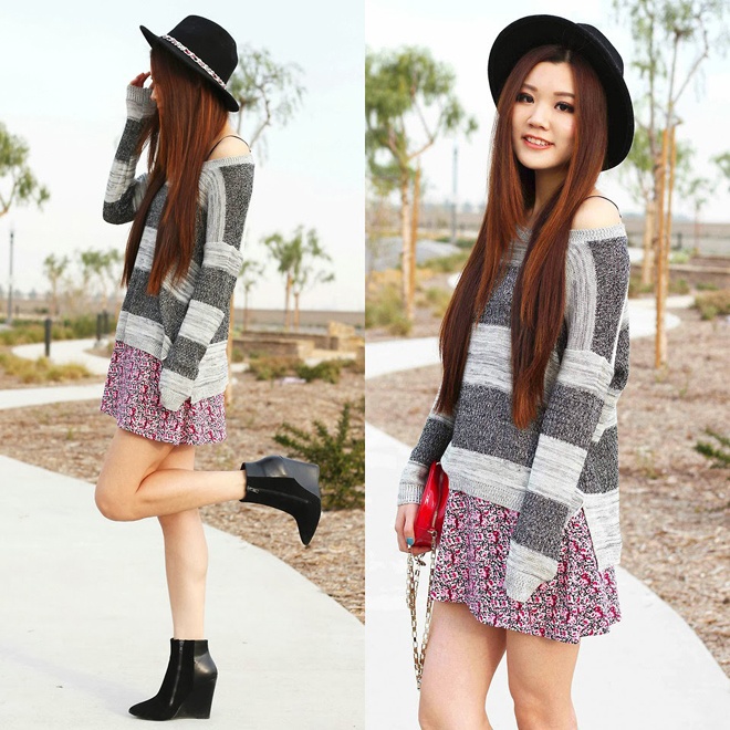 Cũng chiếc áo len sọc xám trắng như trên, nhưng là với một phong cách mới ngọt ngào và yểu điệu hơn.