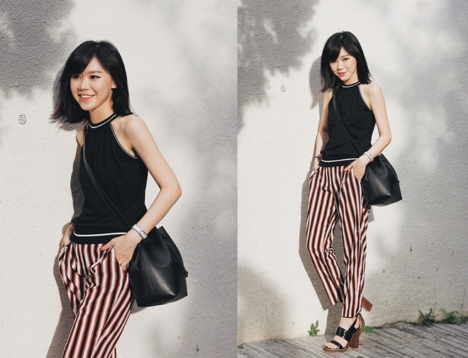  Nếu yêu thích các kẻ sọc như Magic Yang, bạn có thể bắt chước cách phối đơn giản nhất của fashionista này: màu trơn và sọc dọc cùng tông màu.