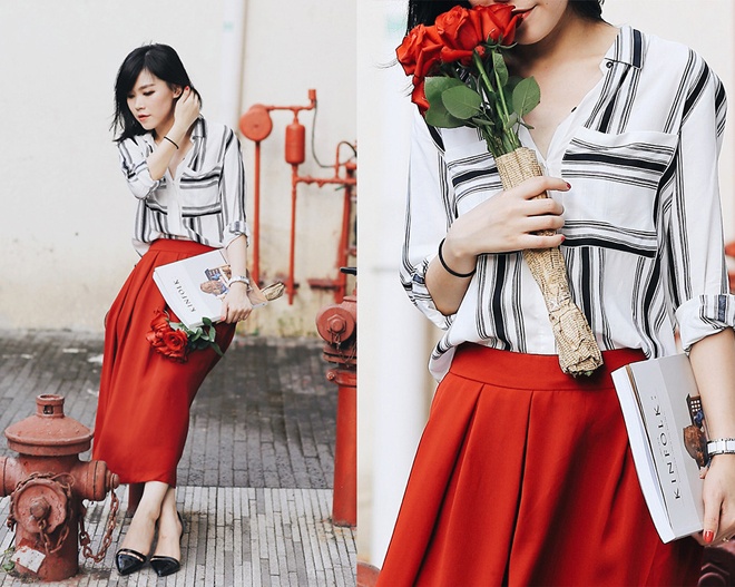 Hoặc “làm mềm” các kẻ sọc đen trắng bản to với một chiếc váy đỏ cam rực rỡ.