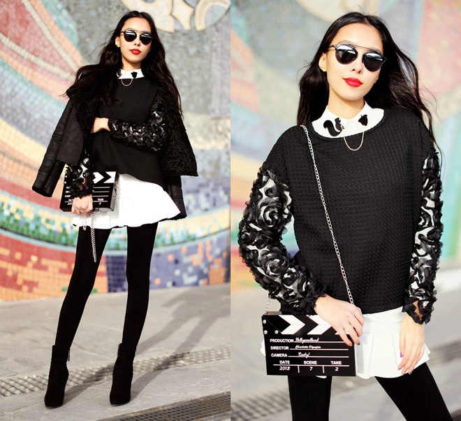 Những đường thêu nổi trên tay áo với chất liệu vải dày kết hợp phối layer giúp fashionista 9X ăn giang bề ngang cho mình khá tốt.