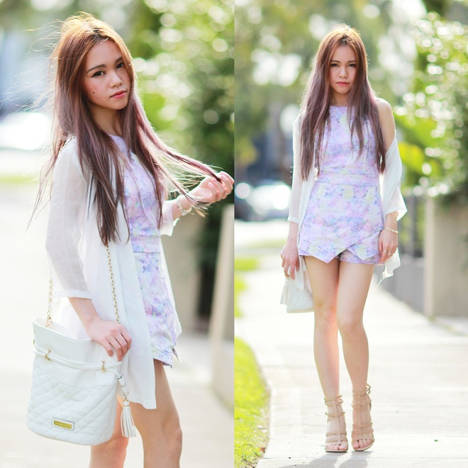 Bằng cách kết hợp monochrome nguyên cây, kèm chiếc áo khoác trắng tinh khiết, Chloe Ting có thể khiến nhiều anh chàng phải trộm nhìn khi dạo bước trên phố.