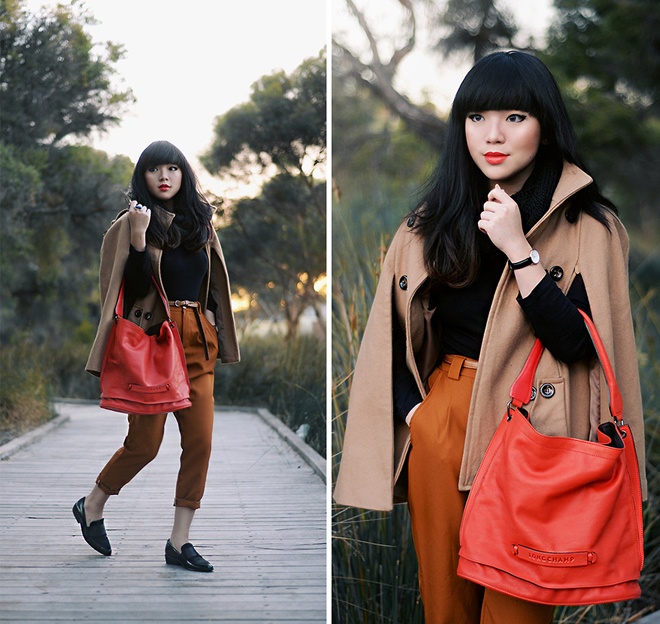 Hay cách phối color block trên cùng 1 bảng màu sành điệu như cô nàng fashionista 9X Willabelle Ong, mà điểm nhấn là chiếc áo len đen tay dài và chiếc túi màu cam rực rỡ.