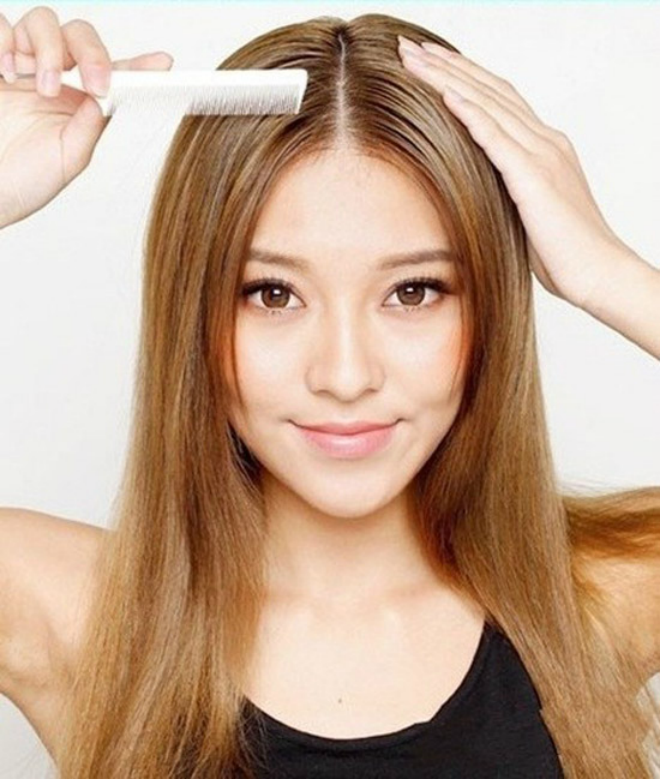 Đi làm: Tóc thẳng rẽ ngôi giữa (lệch) hay búi thấp đều rất phù hợp cho các cô nàng công sở.