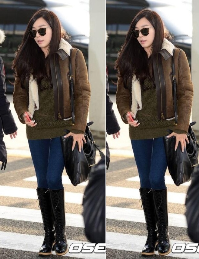 Áo parka là mốt thời trang hot ngày đông lạnh và được nhiều sao Hàn ưu ái. Dáng người mảnh mai như G.Na thì đừng nên bỏ qua set đồ quần skinny, áo phông bên trong, bốt cao cổ và áo choàng parka