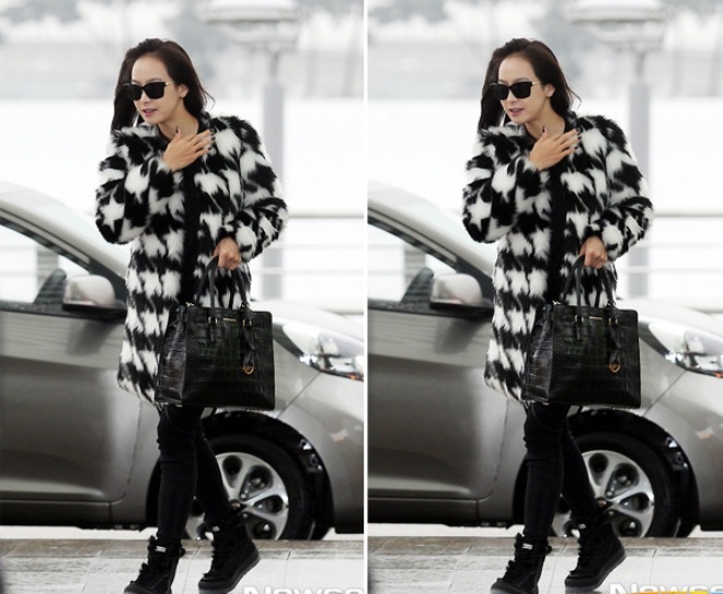 Victoria nhóm F(x) sang chảnh với áo khoác lông hoạt tiết, giày sneaker khi xuất hiện ở sân bay.