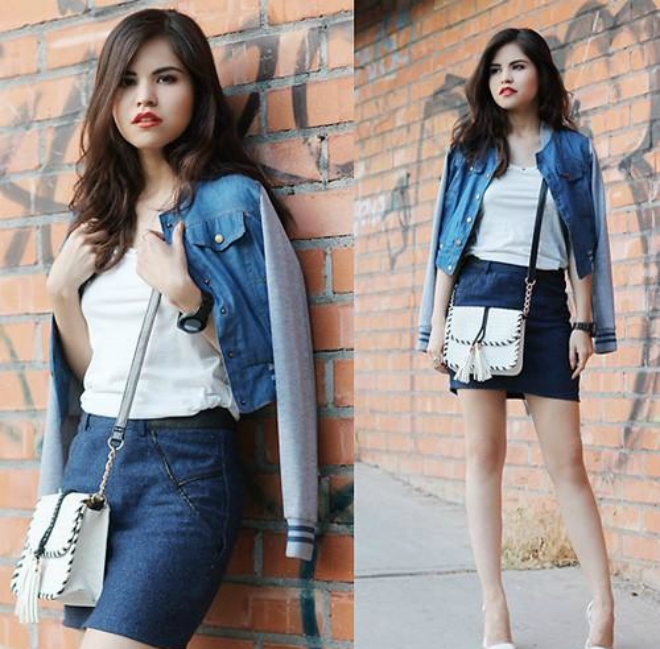 Phong cách thanh lịch của quý cô công sở với váy dạ, áo thun và áo khoác chất liệu denim.