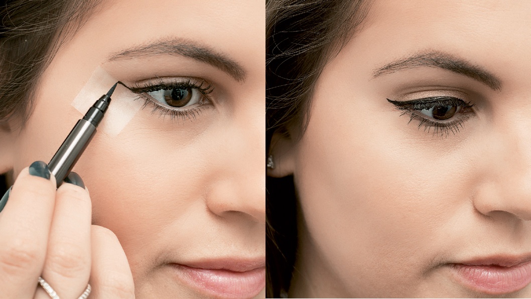 4. Dùng băng keo trong để dễ dàng vẽ viền mắt mèo: Dán băng keo ngay đuôi mắt và chếch 45 độ để tạo đường cat-eye sắc sảo.