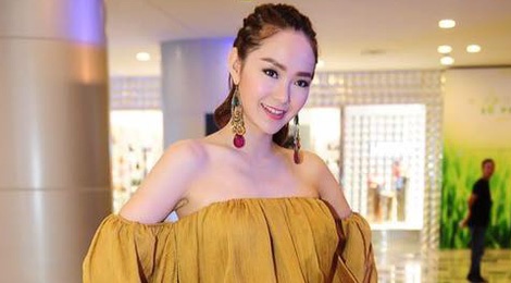 Nhung lan Minh Hang lot top mac xau hinh anh