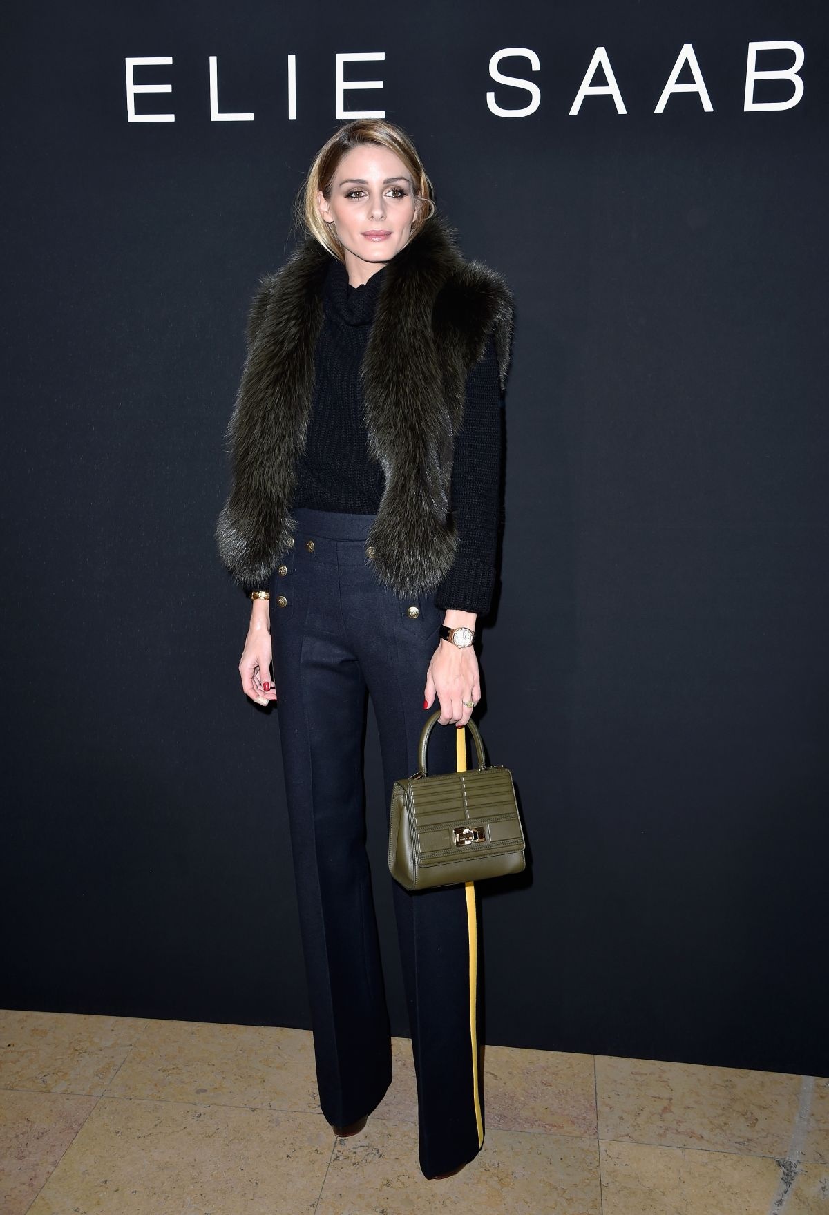 Olivia Palermo diện áo khoác không tay ảnh 2 Olivia Palermo dien ao khoac khong tay anh 2