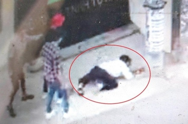 Hai thanh nien tung don hiem ac, ha bao ve cong ty hinh anh