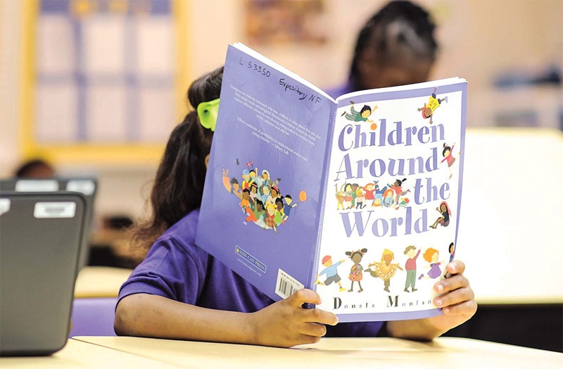 Day con doc sach hinh anh