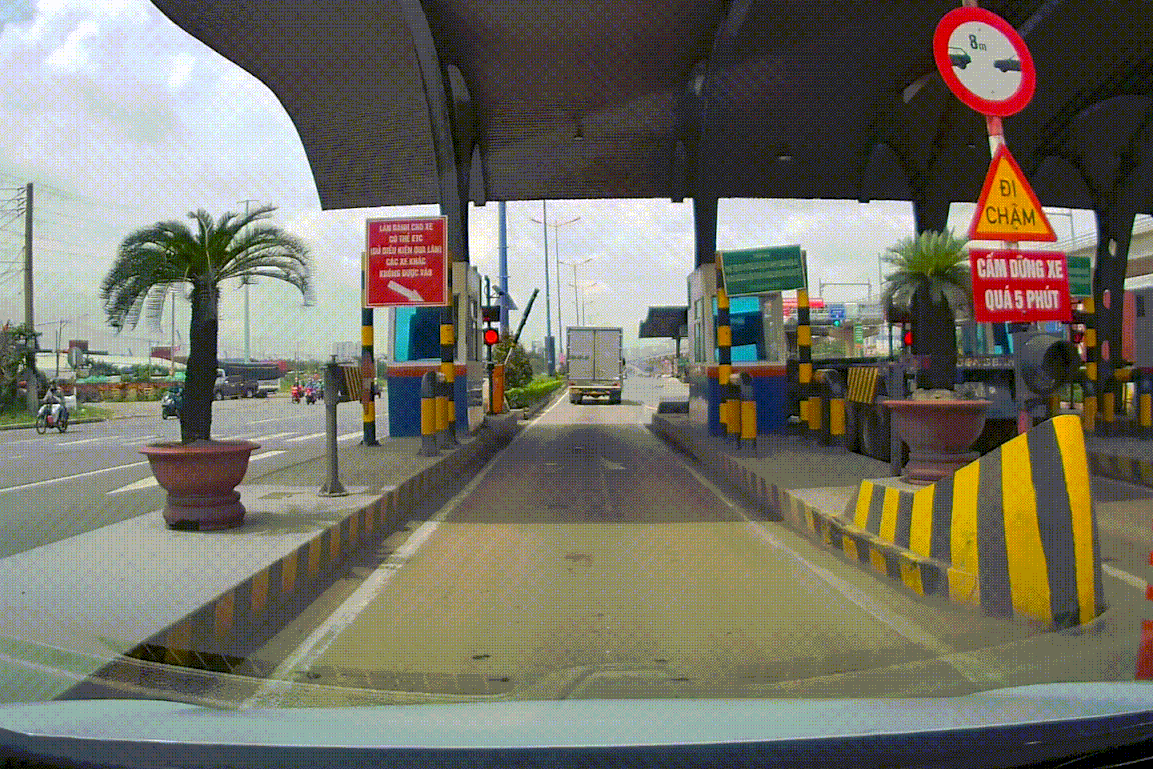 Cach di chuyen an toan qua lan thu phi tu dong hinh anh