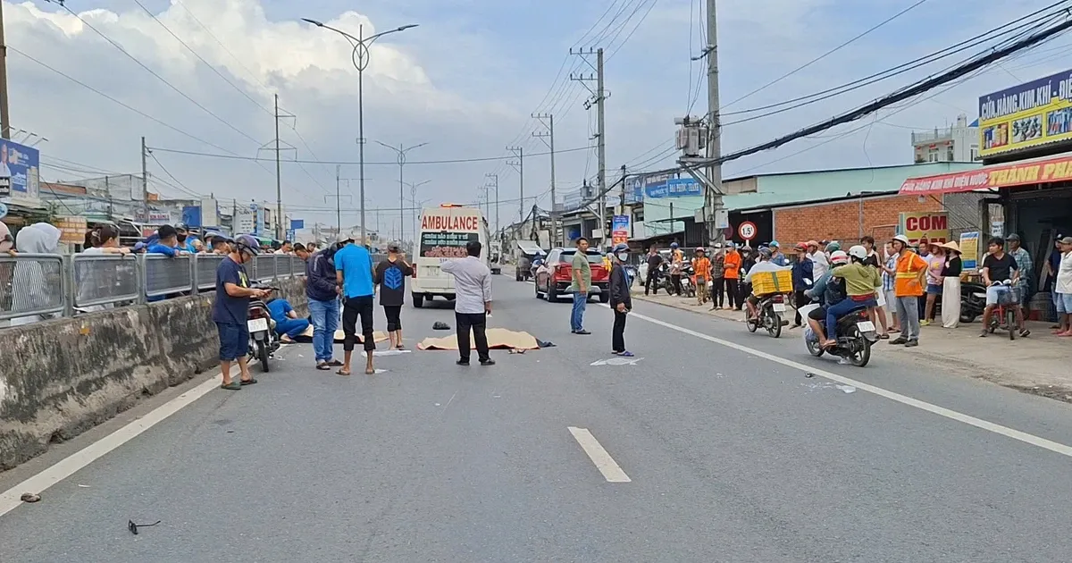 Xe may tong nguoi di bo qua Quoc lo 1, hai nguoi tu vong hinh anh