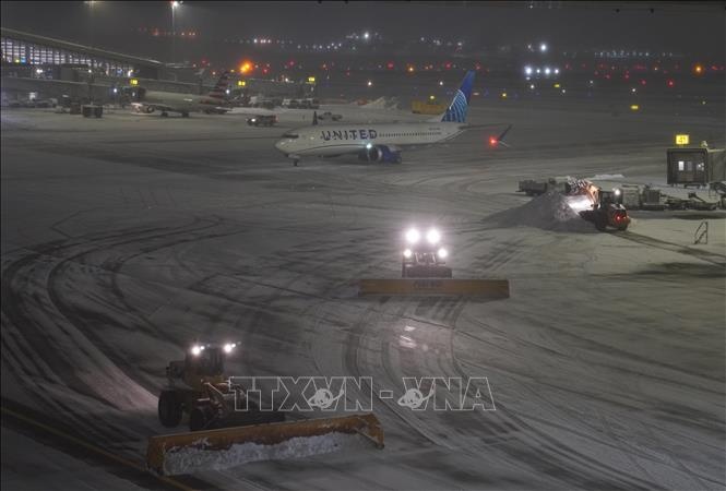 Cuoi tuan hon loan o Dong Bac My vi bao tuyet hinh anh