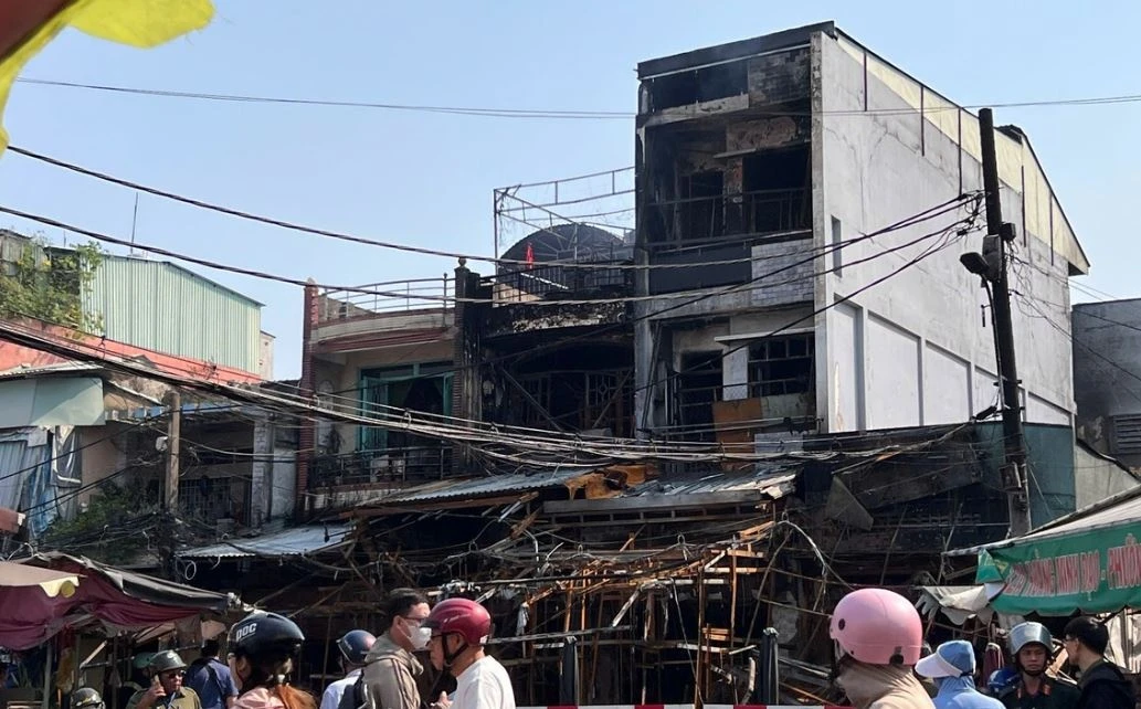 Dien bien moi vu chay lien hoan 4 can nha o TP.HCM hinh anh