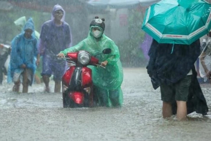 Don khong khi lanh, Bac Bo va Trung Bo mua lon hinh anh