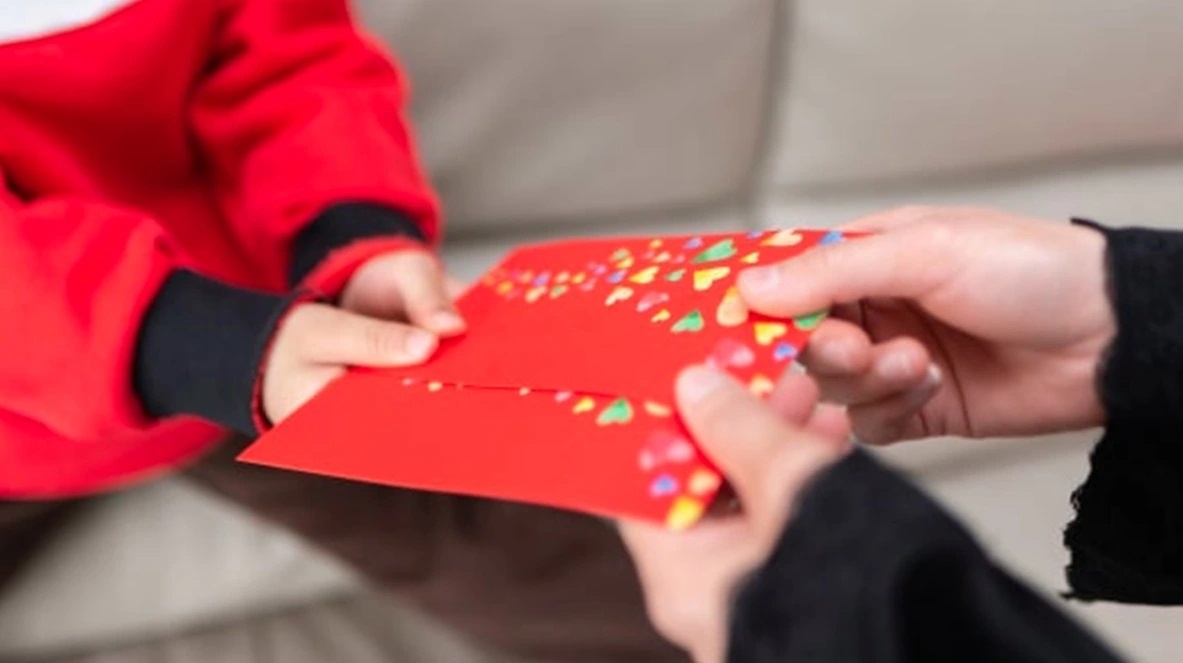 'Giu gium' tien li xi cua con, cha me co the bi phat toi 30 trieu hinh anh