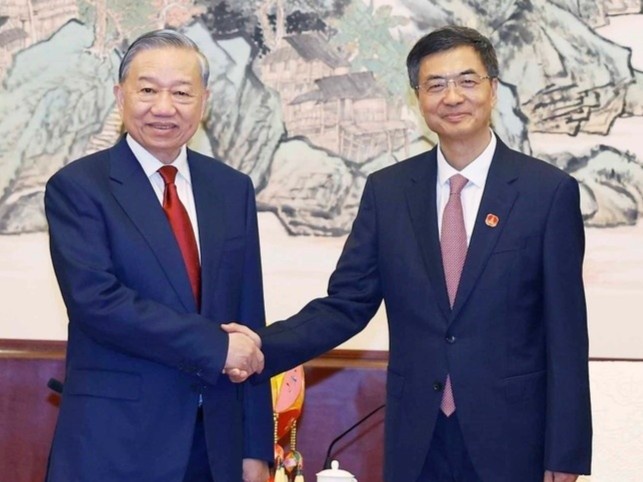 Tong Bi thu, Chu tich nuoc To Lam tiep Bi thu Quang Tay hinh anh