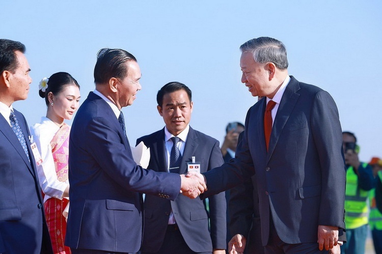 Tong Bi thu den Vientiane, bat dau tham Lao hinh anh