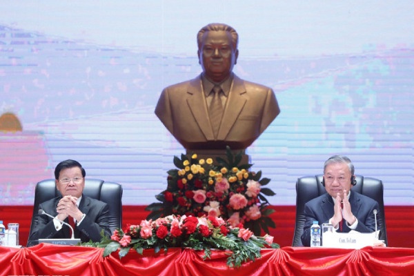 Tong Bi thu thong bao ket qua Dai hoi XIV cua DCS Viet Nam tai Lao hinh anh