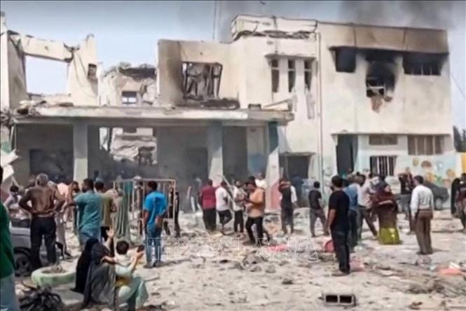 Nga, Trung Quoc va cong dong quoc te keu goi kiem che o Trung Dong hinh anh