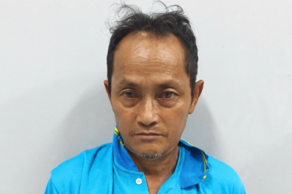 Tam giu bao ve truong tieu hoc bi to hiep dam hoc sinh hinh anh