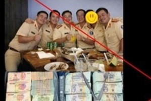 Lat tay chieu dung anh CSGT an mung voi coc tien hinh anh