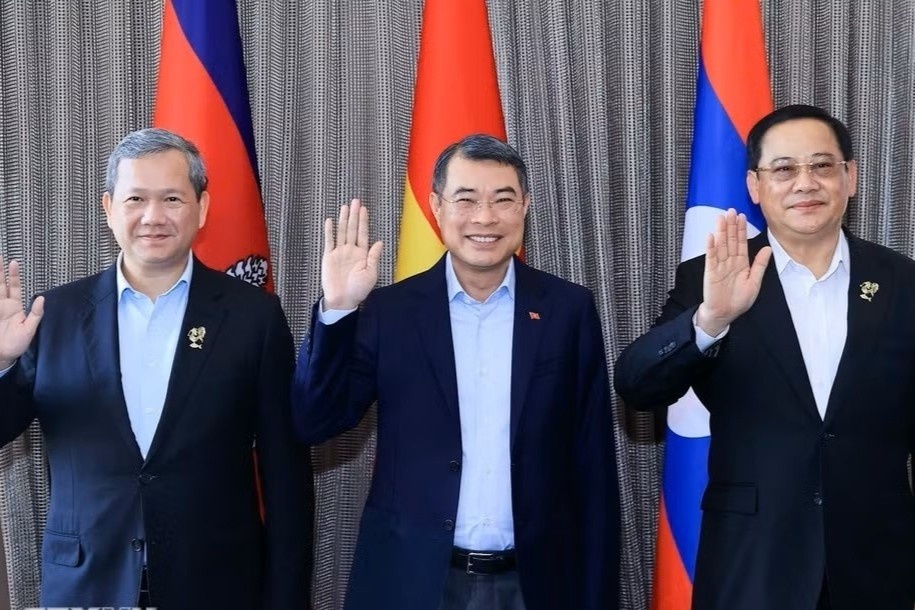 Thu tuong an sang, lam viec voi cac Thu tuong Campuchia va Lao hinh anh