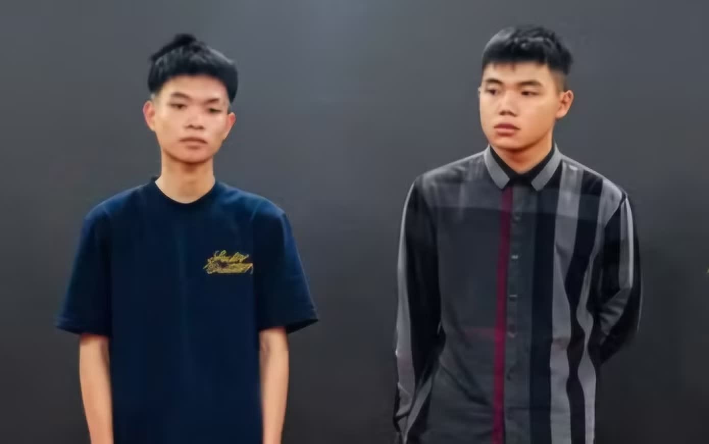 Khoi to 2 doi tuong cam dau vu hon chien tren duong pho Lao Cai hinh anh