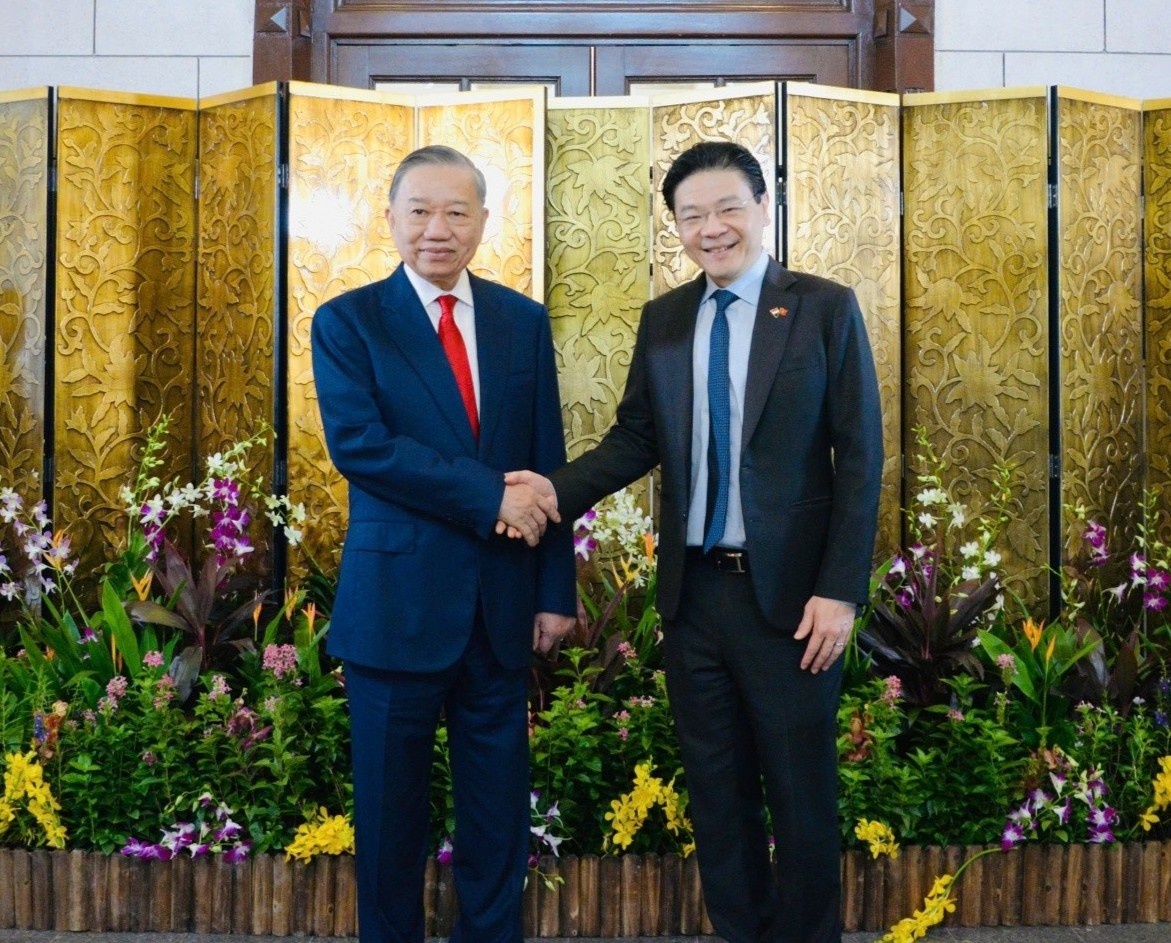 Tong Bi thu, Chu tich nuoc To Lam hoi dam voi Thu tuong Singapore Lawrence Wong hinh anh