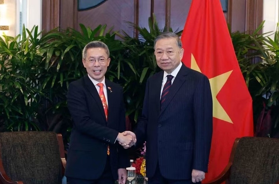 Tong Bi thu, Chu tich nuoc tiep lanh dao mot so doanh nghiep lon cua Singapore hinh anh