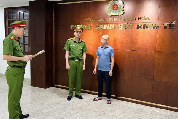 Khoi to giam doc cong ty san xuat 'Nem chua ran Ha Noi' gia hinh anh